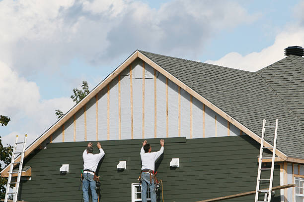 Professional Siding Installation technician working in White Cottage, OH